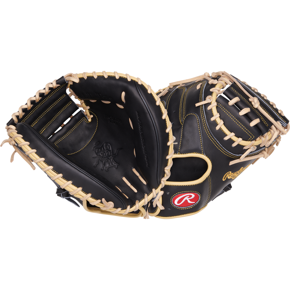 A black and tan Rawlings Heart of the Hide 34" Adley Rutschman Baseball Catcher's Mitt (PRORAR35).