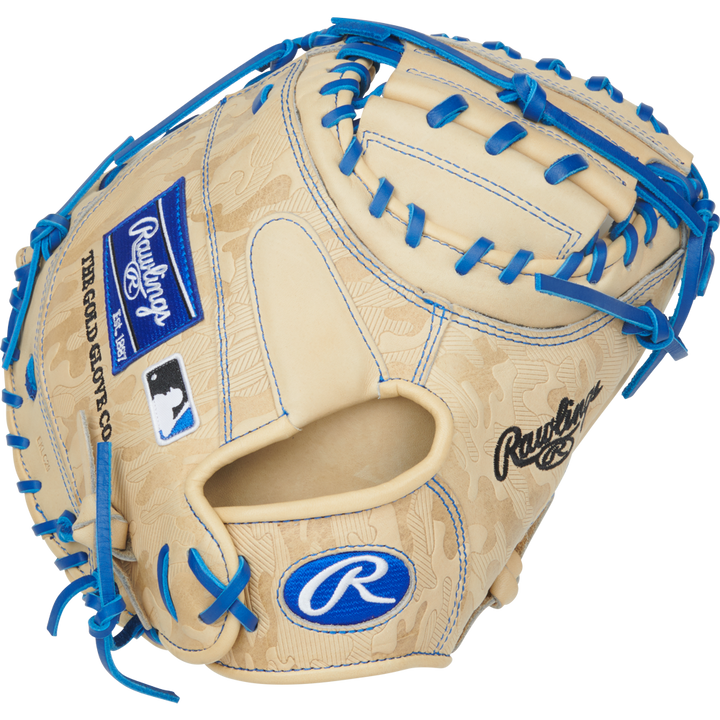 The Rawlings Heart of the Hide 32.5" Baseball Catcher's Mitt (PRORCM325U-23C) features blue straps, a secure Contour Fit, and premium on-field performance.