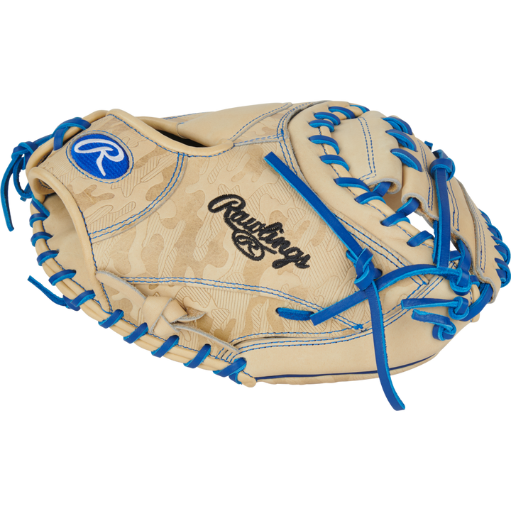 The Rawlings Heart of the Hide 32.5" Catcher's Mitt (PRORCM325U-23C) features tan leather with blue laces and stitching, Rawlings branding on the wrist and web, and Contour Fit technology, displayed against a plain white background.