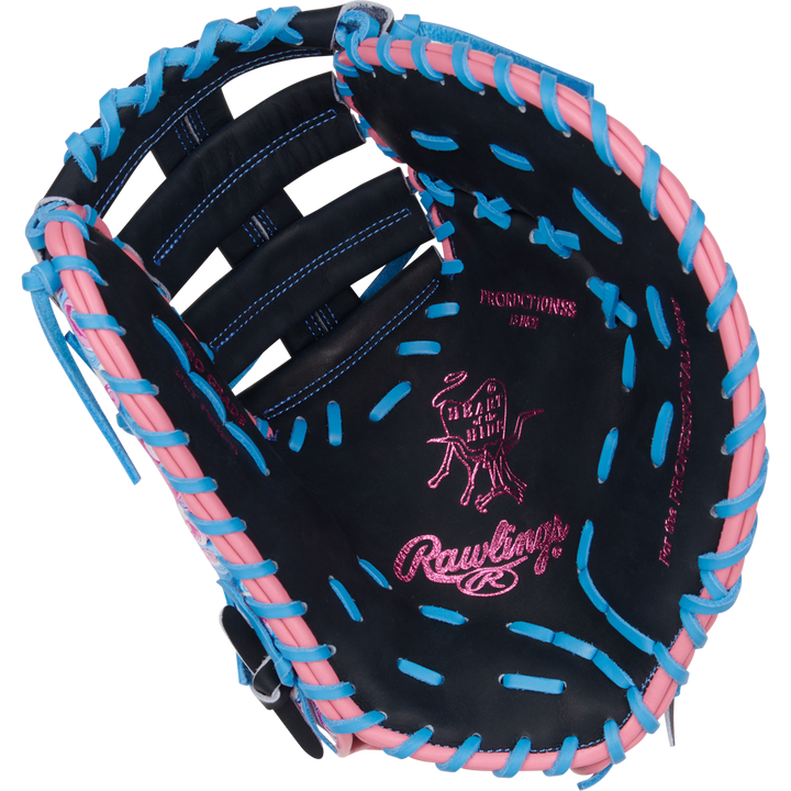 The Rawlings Heart of the Hide 13" ColorSync First Base Mitt (PRORDCT-10NSS) features black leather, pink and blue laces, pink stitching, a cow logo, and palm text—ideal as a standout mitt for first base.