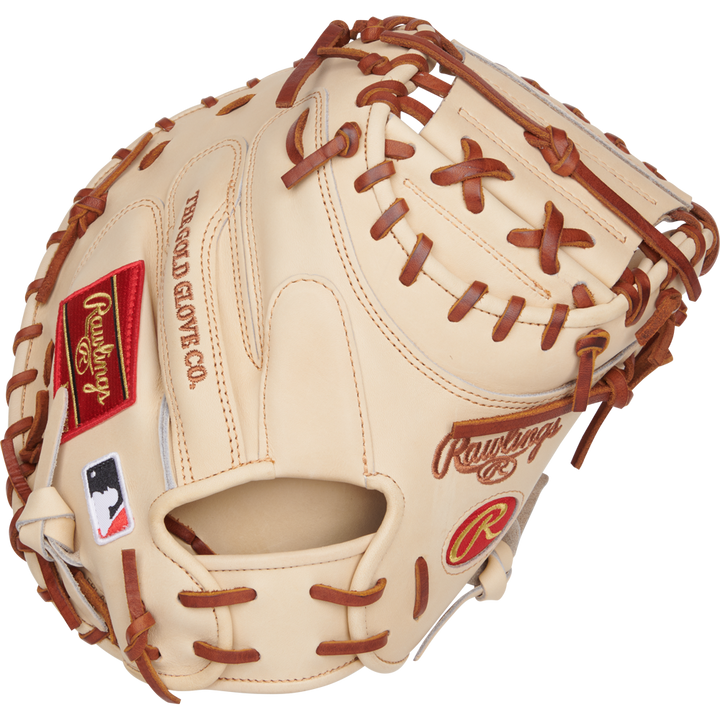 The Rawlings Heart of the Hide 34" Yadier Molina Baseball Catcher's Mitt (PRORYM4C) is a tan mitt with brown laces, red and gold logos, and an MLB patch, displayed on a plain white background.