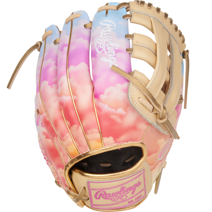 The Rawlings Heart of the Hide 12" Sierra Romero Game Model Fastpitch Glove (PROSR32C) features a pastel sky design with pink and orange clouds, tan laces, and a white embroidered Rawlings logo on the back.