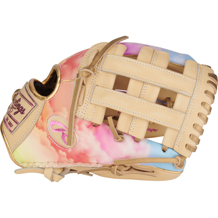 The Rawlings Heart of the Hide 12" Sierra Romero Game Model Fastpitch Glove (PROSR32C) features tan leather lacing and a vibrant pink, blue, and white cloud pattern on the outer surface.
