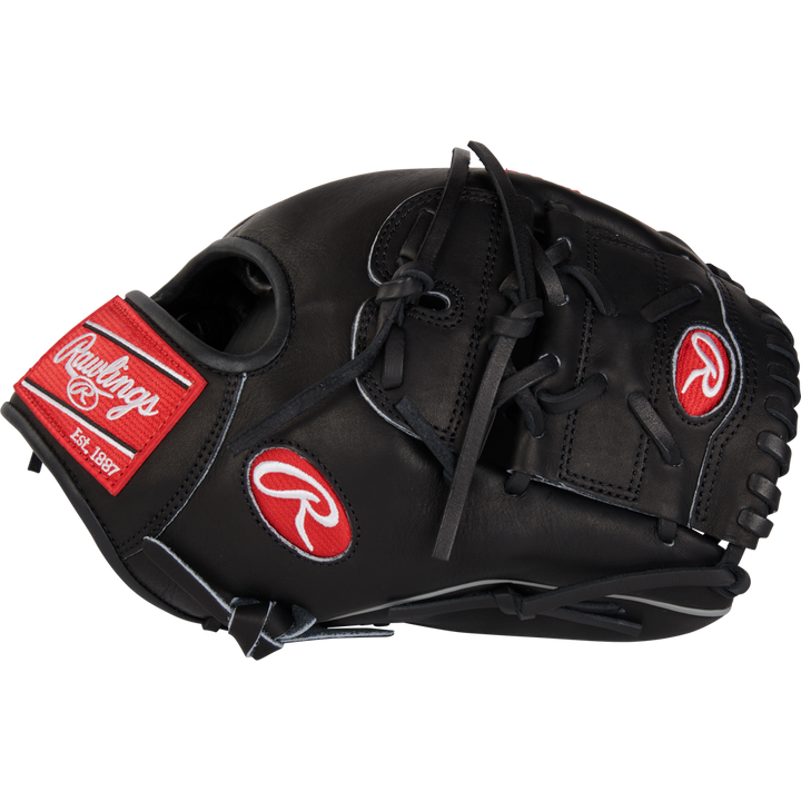 The Rawlings Heart of the Hide 12" Baseball Glove (RPROT206-9B) features a black design with red and white logos, black laces, and stitching—ideal for infielders and pitchers. Shown against a plain white background.
