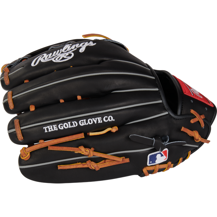 The Rawlings Heart of the Hide 12.75" Baseball Glove (RPROT3029C-6B) is black with brown laces, white stitching, and "THE GOLD GLOVE CO." text. It features the Rawlings logo on the wrist and an MLB logo near the thumb.