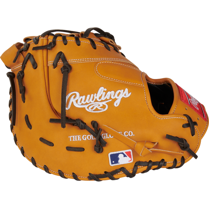 The Rawlings Heart of the Hide 13" First Base Mitt (RPROTDCTT) is a tan glove with black laces, featuring the Rawlings logo, The Gold Glove Co. text, and an MLB patch on the lower mitt.