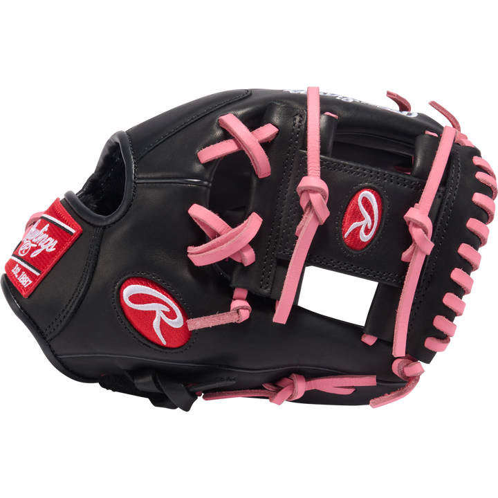 The Rawlings R9 11.25" ContoUR Baseball Glove (R91125U-2BP) is a black youth infield glove with pink laces and accents, plus red and white Rawlings logos on the wrist and thumb—ideal for young baseball players.