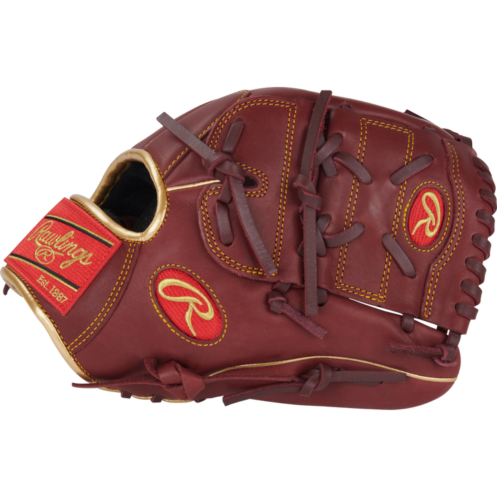 The Rawlings R9 12" Baseball Glove (R9206-9SH) features a brown design with red and yellow accents, visible stitching, and Rawlings logos on the wrist strap and thumb. The glove is closed and shown against a plain white background.
