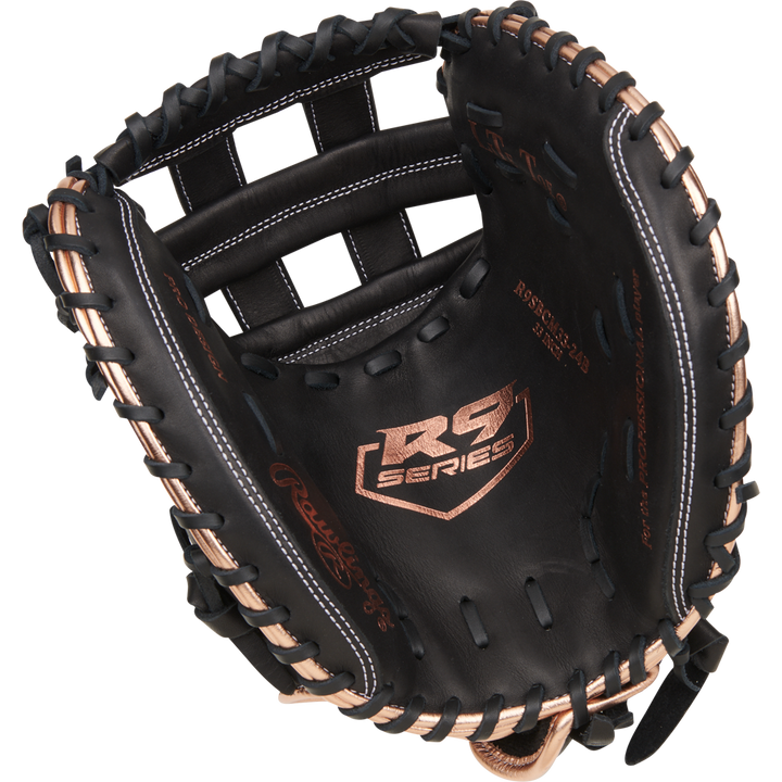 The Rawlings R9 33" Fastpitch Catcher's Mitt (R9SBCM33-24B) features black and gold premium full-grain leather, delivering a sleek look and reliable performance for catchers.