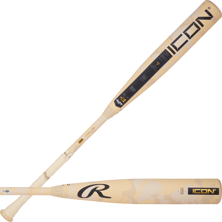 Two tan 2025 Rawlings Icon (-3) BBCOR baseball bats (DEMO), one horizontal and one diagonal, with black and gold branding and a camouflage barrel.