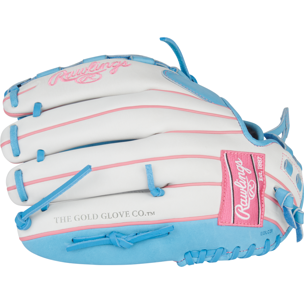 The Rawlings Liberty Advanced 12.5" Fastpitch Glove (RLA125-3WCB) features a white design with pink and light blue accents, blue laces, detailed stitching, and the Rawlings logo—a stylish choice for fastpitch players.