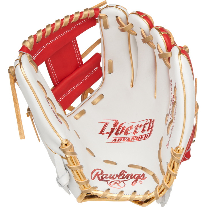 A Rawlings Liberty Advanced Color Sync 11.75" Fastpitch Softball Glove (RLA715SB-2WSG) in white and red with tan laces is open, displaying its palm and signature Rawlings branding inside.
