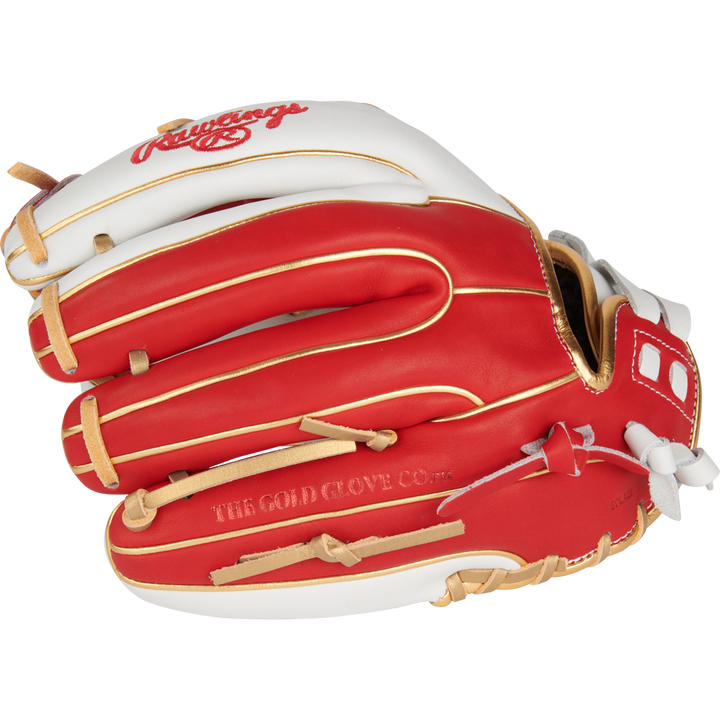 A red and white Rawlings Liberty Advanced Color Sync 11.75" fastpitch softball glove (RLA715SB-2WSG) with tan lacing, featuring The Gold Glove Co. embossed on the side.