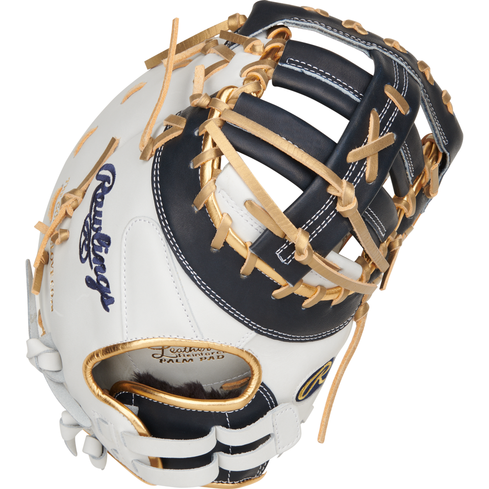 A close-up of the Rawlings Liberty Advanced Color Sync 13" Fastpitch First Base Mitt (RLADCTSBWNG) shows its white and dark navy design with tan laces, open web, and the Rawlings logo embroidered on the side.