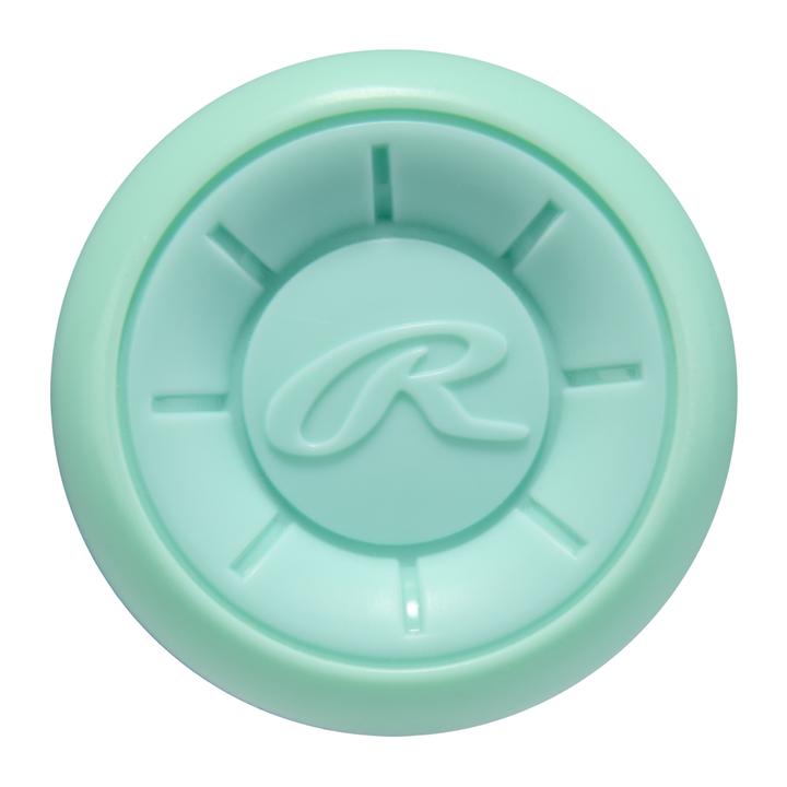 A mint green, round plastic piece with a raised R and eight indented linesâlikely an accessory from the 2026 Rawlings ICON (-8) 2 5/8" USA Baseball Bat (RUS6I8)âis shown on a white background.