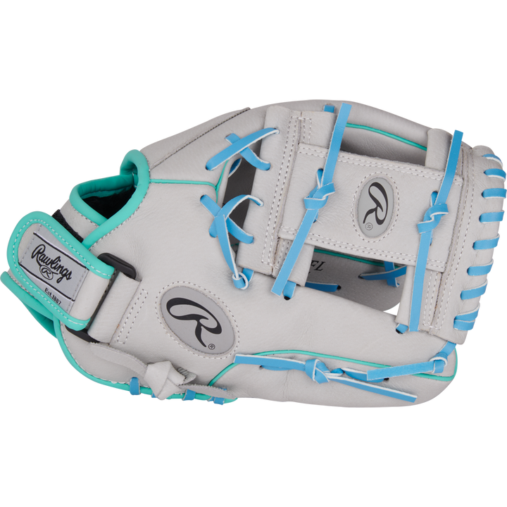 The Rawlings Sure Catch 11.5" Francisco Lindor Youth Baseball Glove (SC115FL) is displayed on a plain light background, featuring a light gray design with teal and blue accents, blue laces, and teal trim.