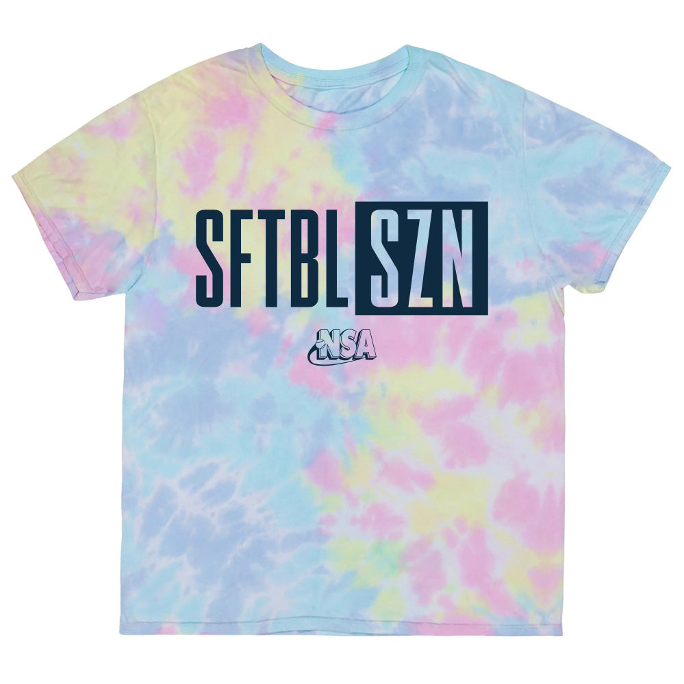 The NSA Softball Season Short Sleeve Shirt by DSG Apparel features pastel pink, yellow, and blue tie-dye with bold black "SFTBL SZN" lettering and smaller white "NSAA," representing the National Softball Association.