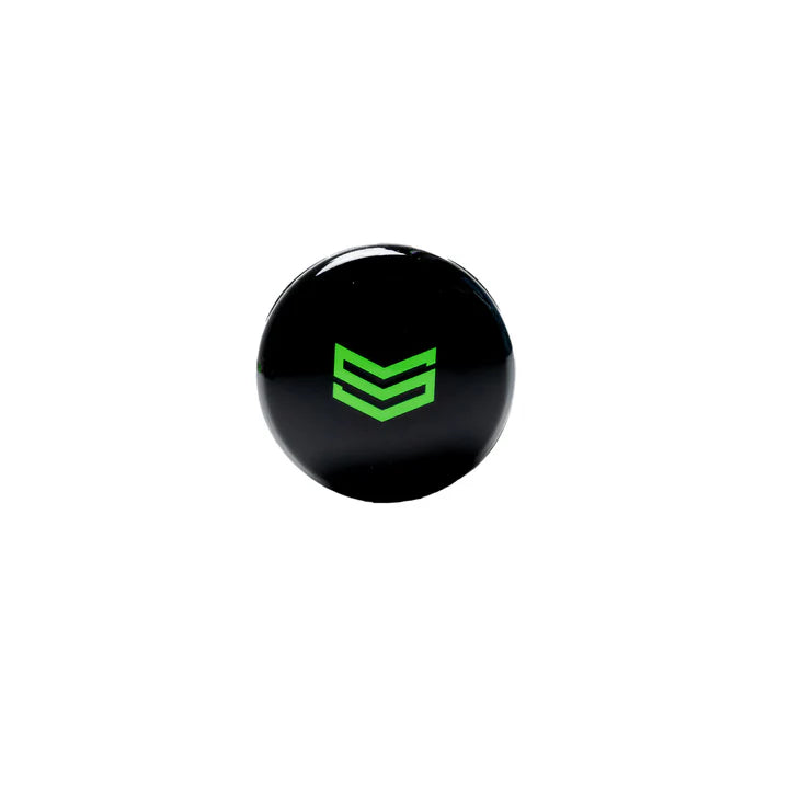 The 2026 Soldier Tank (-10) Fastpitch Softball Bat: S-10-26-2 by Soldier Sports features a round, black button with a green geometric double-chevron design, inspired by trampoline bat technology for a sleek, lightweight swing.