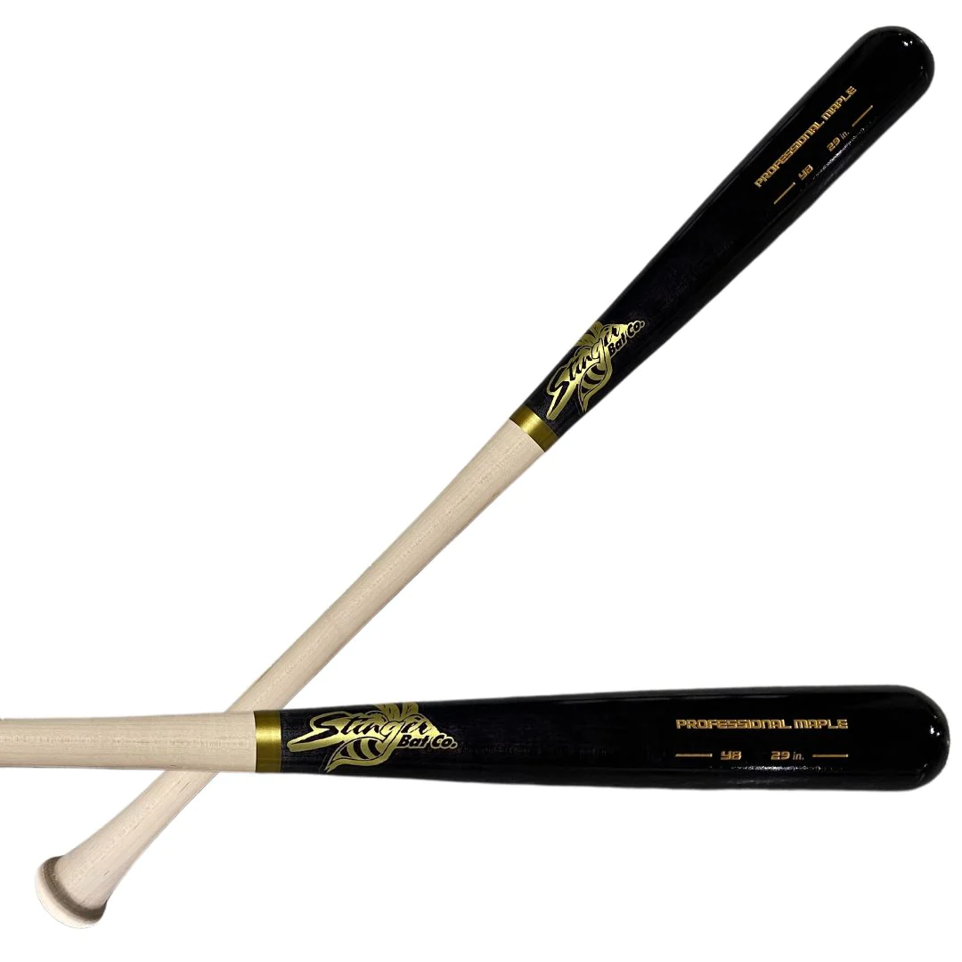 Two Stinger Sports Youth Pro Grade AP5 Maple Wood Bats (SPGYM) with light handles and black barrels crossed, featuring gold logos and text. Ideal for youth training or games as a top-quality wood bat.