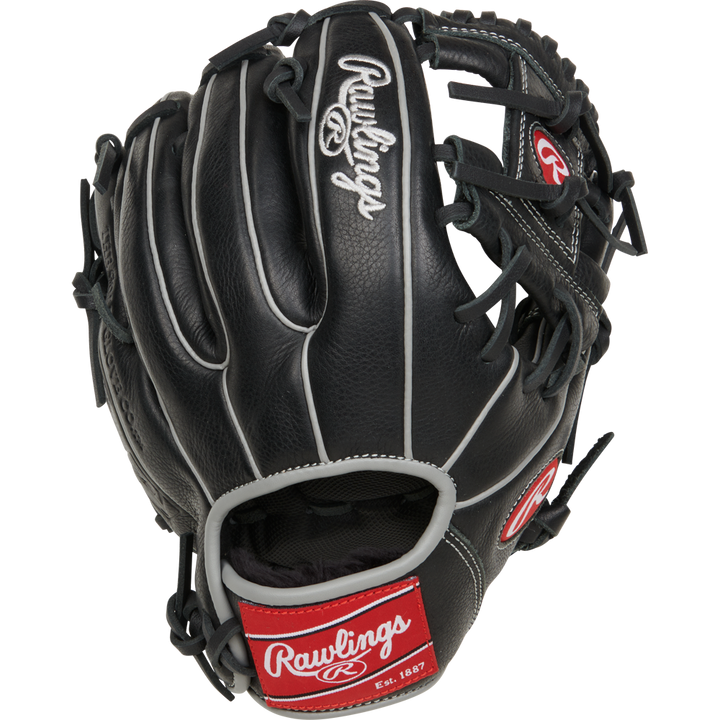 The Rawlings Select Pro Lite 10.5" Carlos Correa youth baseball glove (RSPL105CC) features black leather, white stitching, gray trim, and red Rawlings logos on the wrist strap and thumb, shown palm side forward.