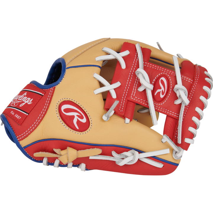 The Rawlings Select Pro Lite 11" Corey Seager Baseball Glove (SPL110CS) features a tan, red, and blue design with white laces, Rawlings branding, and detailed stitching.