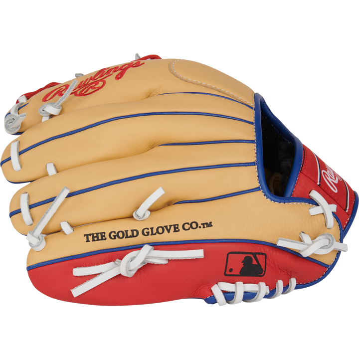 A tan, red, and blue Rawlings Select Pro Lite 11" Corey Seager baseball glove (SPL110CS) with white laces, featuring THE GOLD GLOVE CO. and the MLB logo on the side.