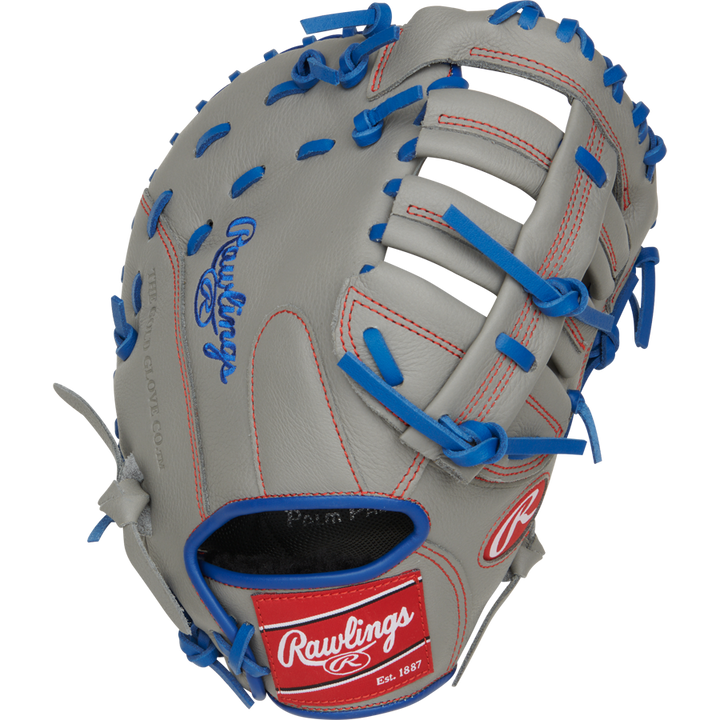 The Rawlings Select Pro Lite 11.5" Freddie Freeman First Base Mitt (SPL115FF) is a gray youth glove with blue laces, red stitching, and blue and red Rawlings logos. It features an open web design and visible finger slots.