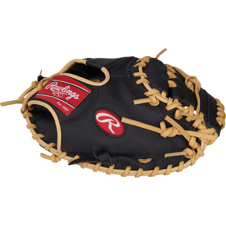 The Rawlings Select Pro Lite 32" Adley Rutschman Baseball Catcher's Mitt (SPLCM32AR) is a youth mitt with a distinctive red logo, inspired by Adley Rutschman's glove.