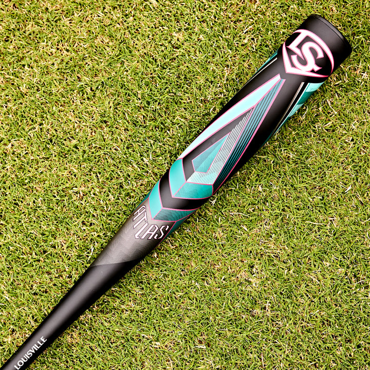 The 2025 Louisville Slugger Atlas (-3) BBCOR Baseball Bat: WBL2968010 (DEMO) from Louisville Slugger rests on the grass, highlighting its sleek one-piece alloy design.