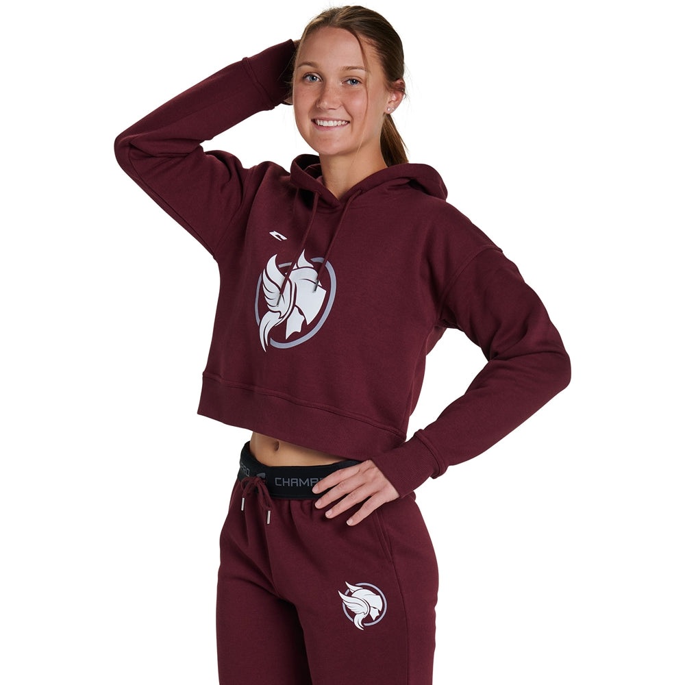 A woman wearing a Champro Sports National Softball Association NSA Home Plate Women's Crop Hoodie.