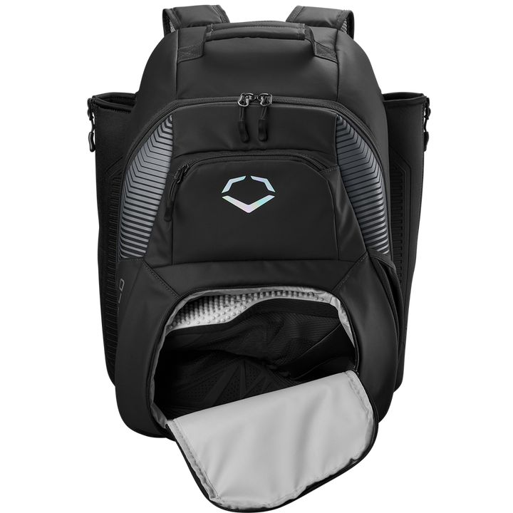 The EvoShield Tone Set Backpack: WB57304 is a black, water-resistant bag with front zipper pocket, side pockets, padded shoulder straps, ventilated lower compartment (flap open), and a geometric logo—perfect for baseball gear.