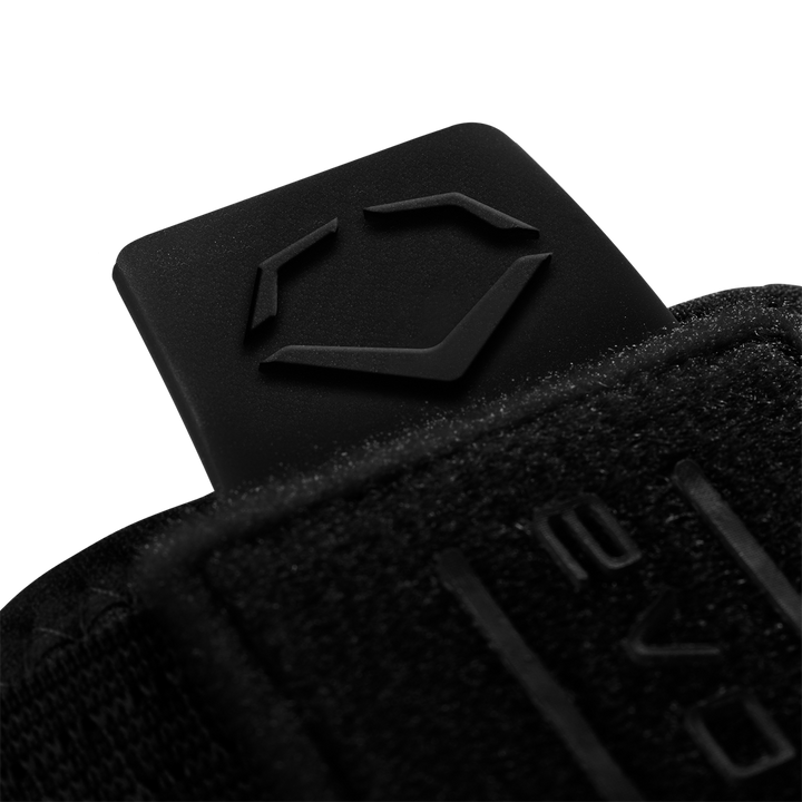 The EvoShield Sliding Mitt 2.0 (WB57537) by EvoShield is a black baseball sliding mitt with a black square, designed to protect your hand during slides.