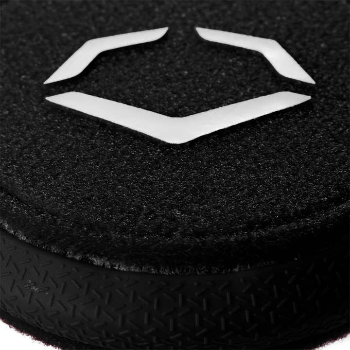 Close-up of the EvoShield Sliding Mitt 2.0 (WB57537) by EvoShield, featuring a black textured surface with a white geometric logo and a patterned rubber edge for enhanced hand protection.