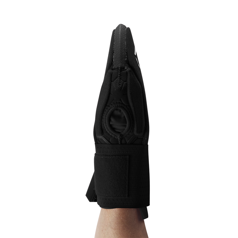 A personโs forearm is shown from the side against a plain white background, wearing the EvoShield Sliding Mitt 2.0: WB57537 by EvoShield, a black sliding mitt with a thumb hole designed for added hand protection.