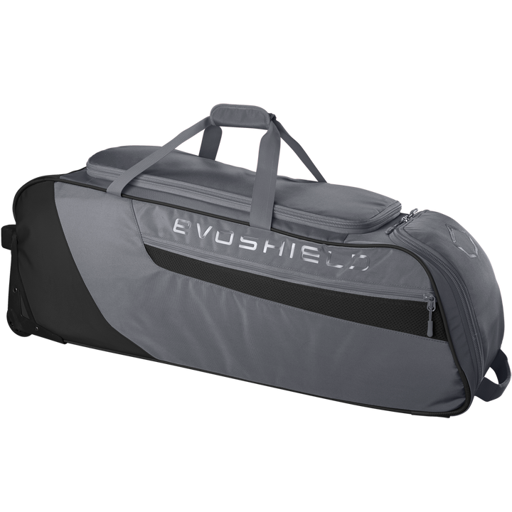 The EvoShield Takeover Wheeled Bag (WB57572) is a large gray baseball gear bag with black accents, side pocket, bat sleeves, carrying handles, and wheels for easy transport, shown against a plain white background.