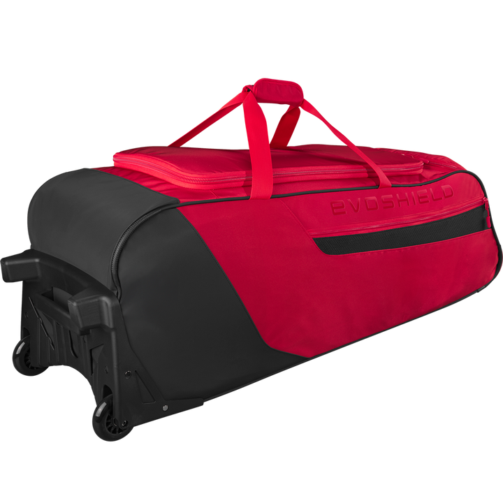 The EvoShield Takeover Wheeled Bag (WB57572) by EvoShield is a large red and black bag with bat sleeves, zippered top, two handles, and reinforced corners—ideal for athletes as a durable baseball gear or travel bag.