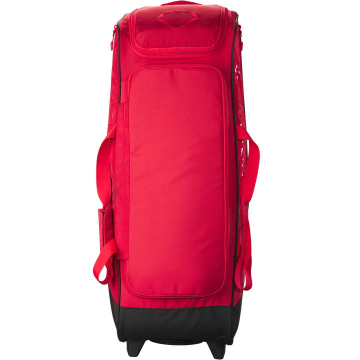 The EvoShield Takeover Wheeled Bag (WB57572) by EvoShield is a large red baseball gear bag with a black bottom, multiple handles, bat sleeves, and a zippered top compartment, shown standing upright against a white background.