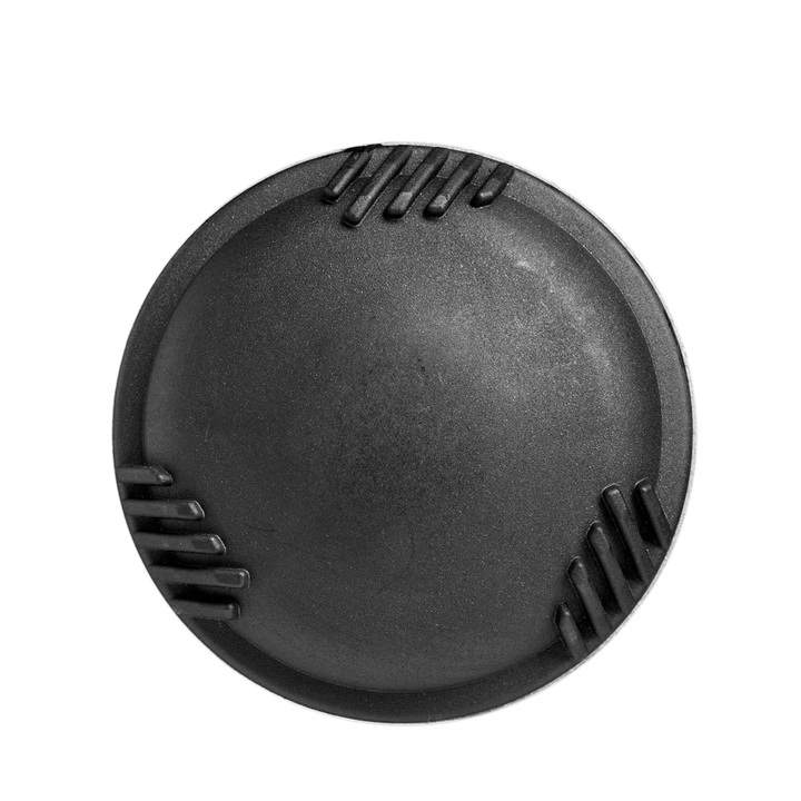 A round, black object with a smooth domed center and three sets of parallel grooves along its edge, reminiscent of the precision engineering in the DeMarini The Goods (-8) USSSA Baseball Bat (WBD2536010), sits on a plain white background.