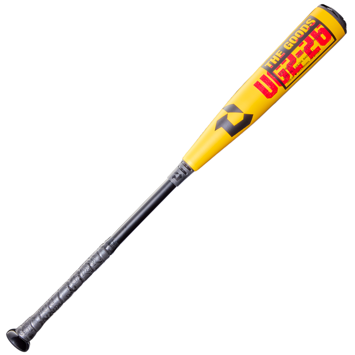 The 2026 DeMarini The Goods (-10) 2 5/8" USA Baseball Bat (WBD2601010) features a yellow and black design, durable X14 Alloy Barrel, bold “THE GODDS UPZ36” print, and a textured grip for superior control and power.