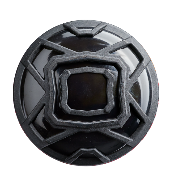 A black circular object with a black center, echoing the sleek design of the 2026 DeMarini The Goods Sticker Bomb (-3) BBCOR Baseball Bat: WBD2653010.