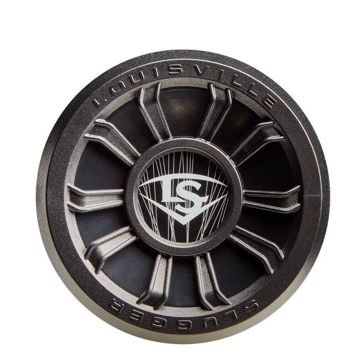A close-up of the 2026 Louisville Slugger Select PWR (-10) USA Baseball Bat end cap highlights its round, metallic design with a central LS logo and spoke-like elements engineered for added vibration control.