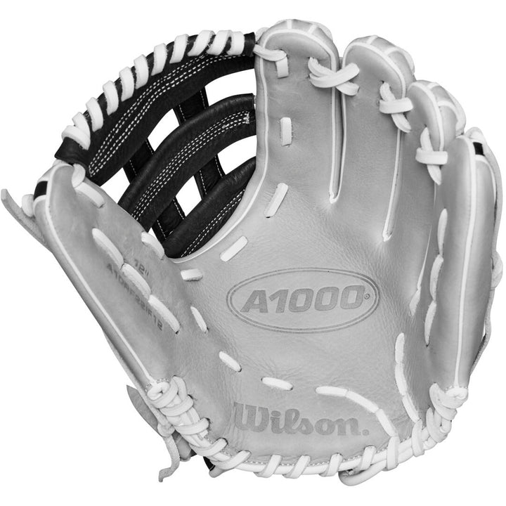The Wilson A1000 IF12 12" Fastpitch Glove (WBW10145612) by Wilson features white leather, black accents, and white laces with an embossed logo—ideal for youth players seeking a dependable softball infield glove.