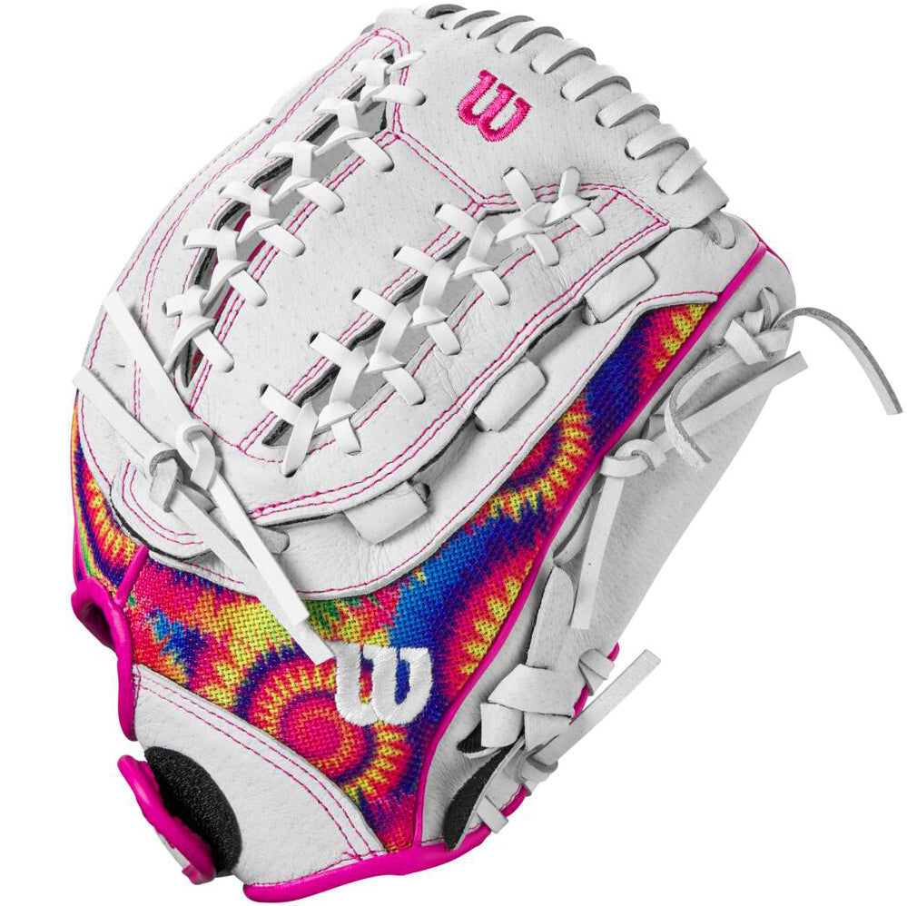The Wilson Flash 12" Fastpitch Glove: WBW10164212 features white leather, pink stitching, rainbow tie-dye patterns, and the Wilson logo—an eye-catching youth softball glove from Wilson for standout style on the field.