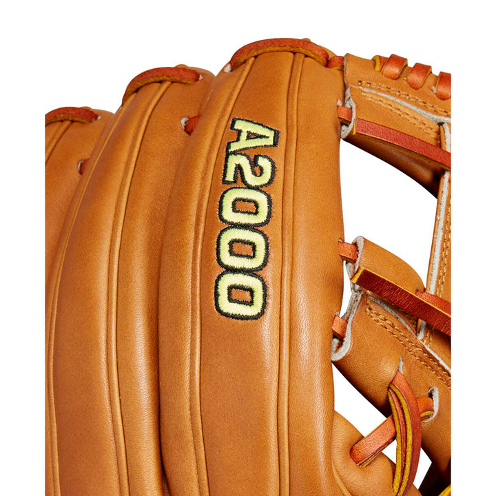 Close-up of the Wilson A2000 1975 Glove Day Series 11.75" baseball glove, crafted from Pro Stock leather with detailed stitching and black/yellow embroidery—ideal for infield play. Model: WBW1020761175.