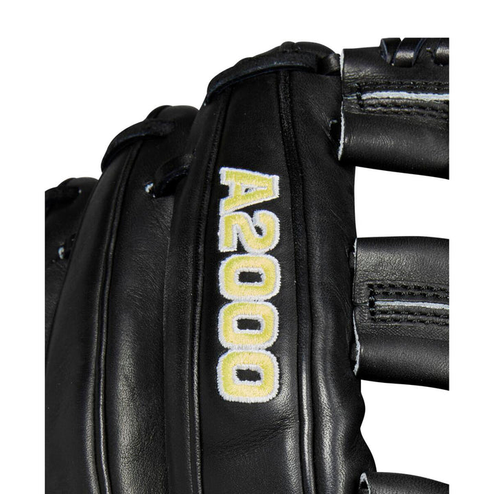 Close-up of the Wilson A2000 DW5 12" Baseball Glove (WBW10207712) by Wilson, featuring black Pro Stock leather, Dual Post Web design, and yellow and white A2000 embroidery with visible webbing and lacing details.