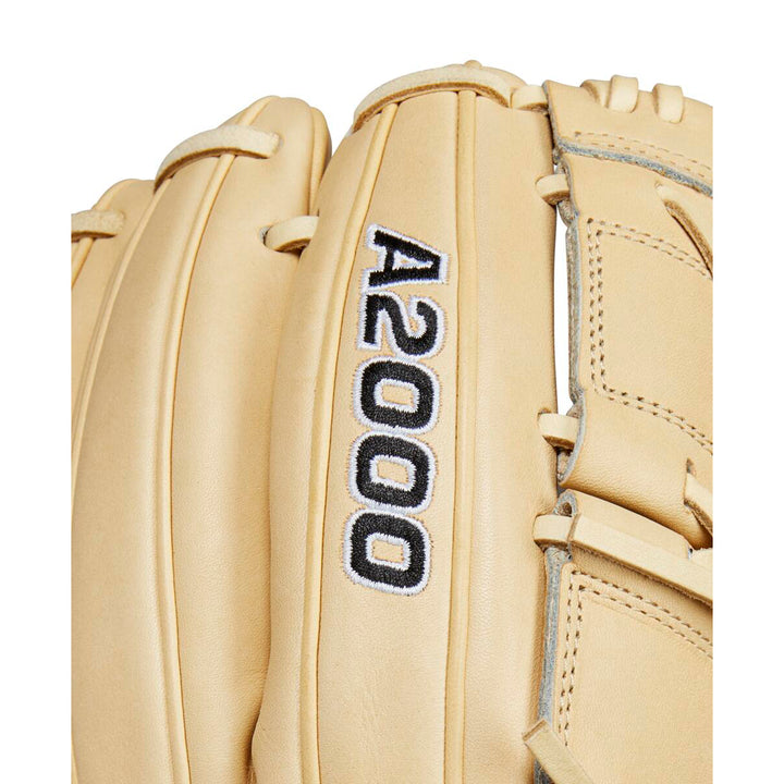 A close-up of the Wilson A2000 B2 12" Baseball Glove (WBW10208112) shows tan Pro Stock leather with black and white stitching, visible laces, and the model number on the back.