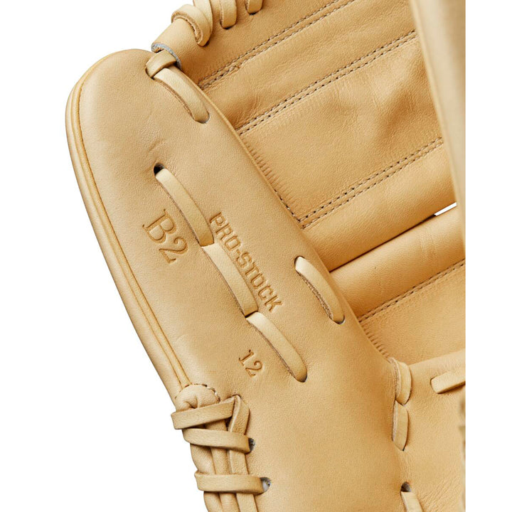 Close-up of a tan Wilson A2000 B2 12" Baseball Glove (WBW10208112) with Pro Stock leather, detailed stitching, and "B2 PRO STOCK 12" embossed inside the pitcher’s glove.