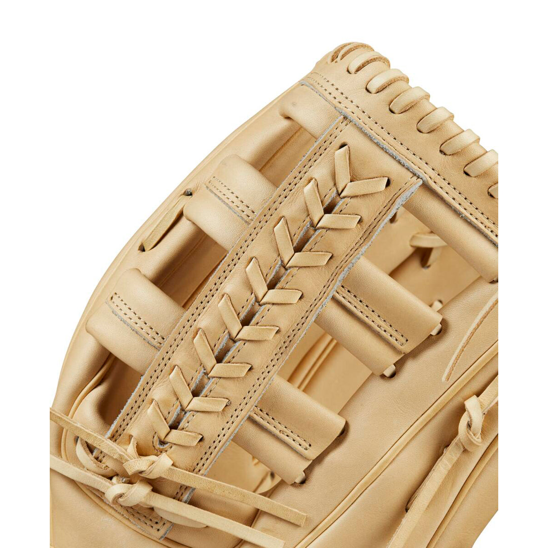 Close-up of the Wilson A2000 1810 12.75" Baseball Glove (WBW1020881275), made with tan Pro Stock® leather, highlighting intricate stitching and lacing on the webbing and edges against a white background.