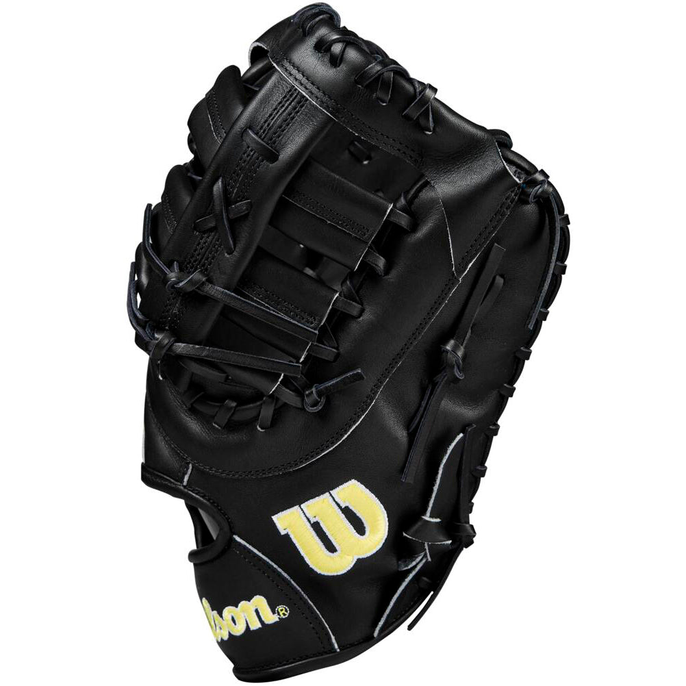 The Wilson A2000 1679 12.5" First Base Mitt (WBW102095125) by Wilson features a black design, yellow W logo, Pro Stock leather, detailed stitching, and intricate lacing.