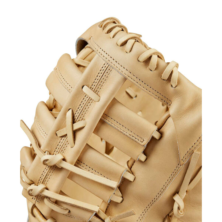 A close-up of the Wilson A2000 1679 12.5" Baseball First Base Mitt (WBW102097125) showcases its Pro Stock leather construction and the premium quality details Wilson is known for.